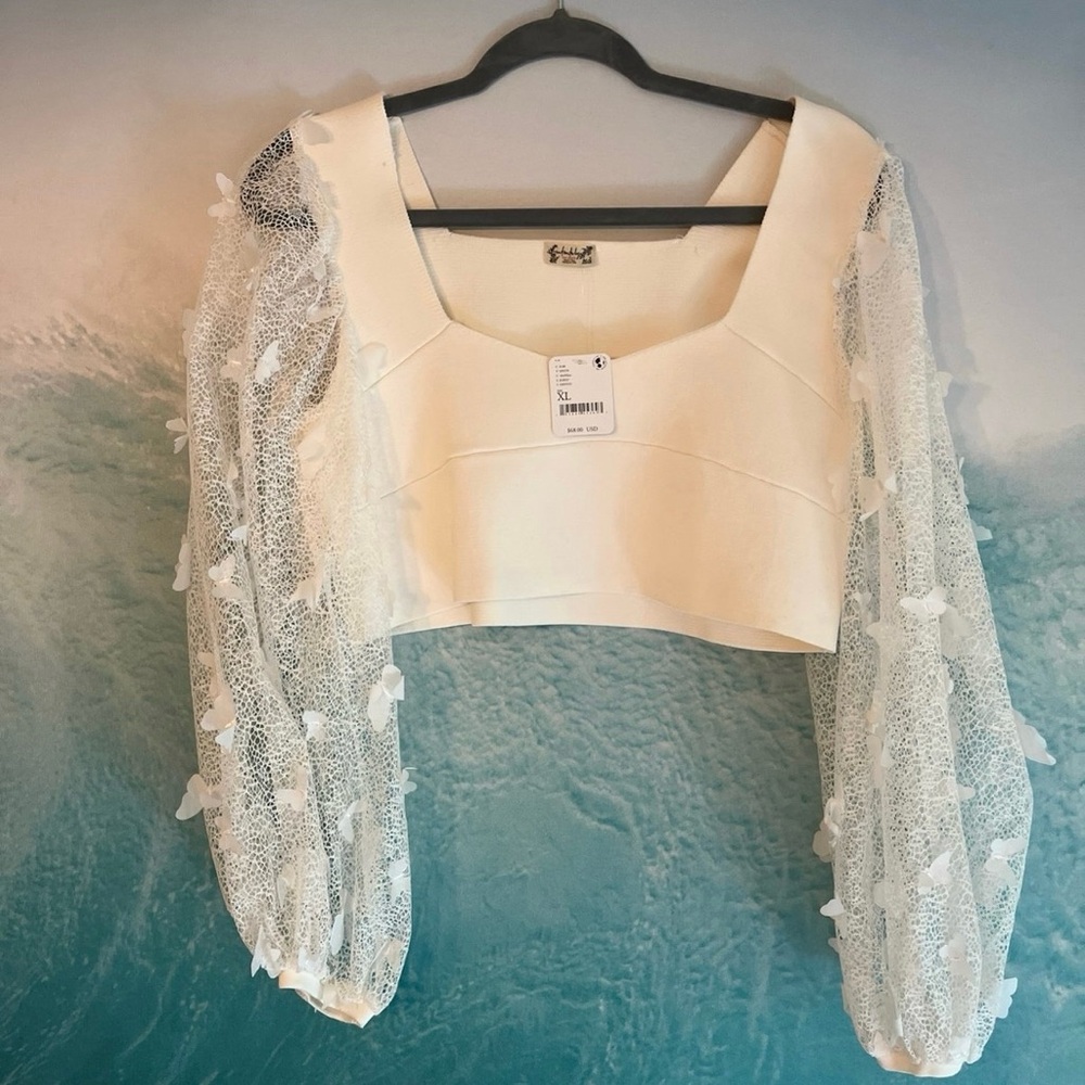 Free people flutter by top